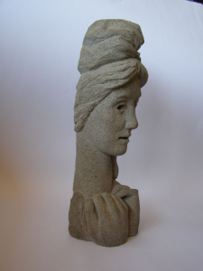 A woman's head. 1960's. 39 cm. Pumice